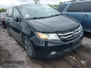 2014 Honda Odyssey Touring with VIN 5FNRL5H94EB079518, listed as a IAAI auction lot 42095098 with 141,019 mi miles and . Bid and sale history available at DreamBid. Image 1.
