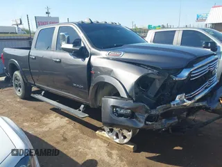 2020 Ram 2500 Laramie z VIN 3C6UR5FL0LG230960, wystawiony jako IAAI lot #42029886 z przebiegiem 61 544 mil mil oraz . Historia ofert i sprzedaży dostępna na DreamBid. Obrazek 12.