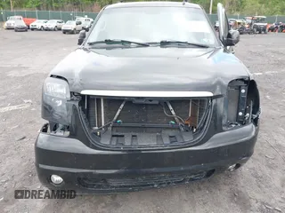 2007 GMC Yukon SLT z VIN 1GKFK13057R336128, wystawiony jako IAAI lot #42301778 z przebiegiem 153 227 mil mil oraz . Historia ofert i sprzedaży dostępna na DreamBid. Obrazek 6.