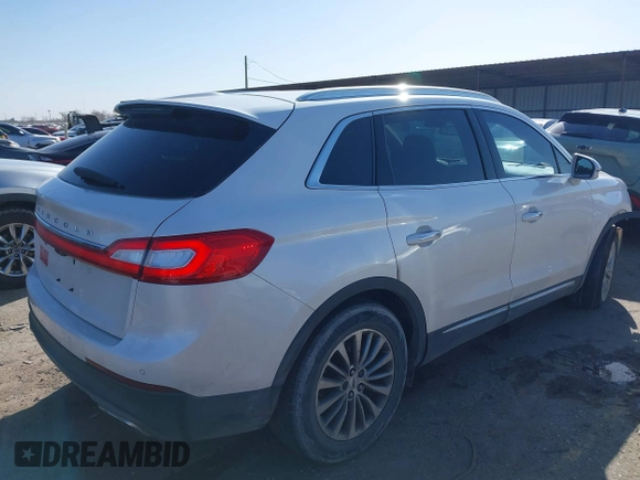 2016 Lincoln MKX Select with VIN 2LMTJ6KR1GBL75185, listed as a IAAI auction lot 41706363 with 135,844 mi miles and . Bid and sale history available at carsss.com. Image 4.