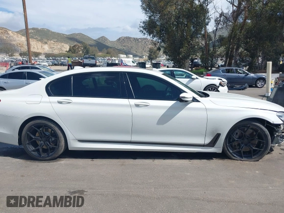 2017 BMW 7 Series 750i with VIN WBA7F0C32HGM22273, listed as a IAAI auction lot 41857151 with 90,518 mi miles and . Bid and sale history available at carsss.com. Image 13.