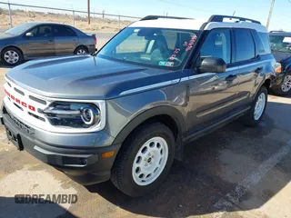 2024 Ford Bronco Sport Heritage with VIN 3FMCR9G64RRE03926, listed as a IAAI auction lot 41641234 with 7,372 mi miles and . Bid and sale history available at DreamBid. Image 2.