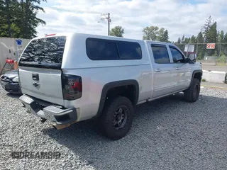 2017 Chevrolet Silverado 1500 LT with VIN 3GCUKREC7HG233366, listed as a IAAI auction lot 42254699 with 105,655 mi miles and . Bid and sale history available at DreamBid. Image 4.