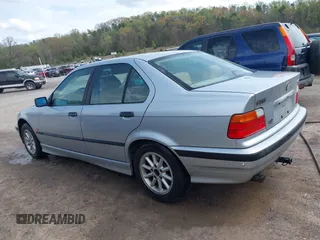 1998 BMW 3 Series 318i with VIN WBACC9322WEE60522, listed as a IAAI auction lot 41944303 with 226,799 mi miles. Bid and sale history available at carsss.com. Image 3.