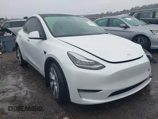 2021 Tesla Model Y Long Range with VIN 5YJYGDEEXMF228914, listed as a IAAI auction lot 41409806 with 48,276 mi miles. Bid and sale history available at carsss.com. Image 1.