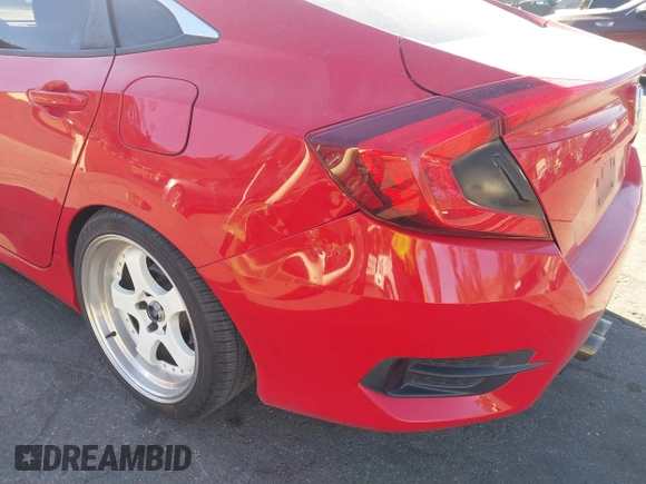 2019 Honda Civic Sport with VIN 2HGFC2F81KH538037, listed as a IAAI auction lot 41377964 with 72,560 mi miles and . Bid and sale history available at DreamBid. Image 12.
