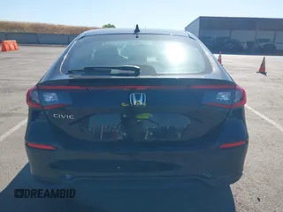 2022 Honda Civic LX z VIN 19XFL2H56NE023472, wystawiony jako IAAI lot #42257114 z przebiegiem 12 149 mil mil oraz . Historia ofert i sprzedaży dostępna na DreamBid. Obrazek 16.
