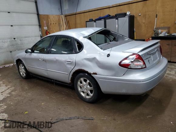 2004 Ford Taurus SE with VIN 1FAFP53224G175353, listed as a Copart auction lot 52713935 with 213,375 mi miles and Salvage Title. Bid and sale history available at DreamBid. Image 2.