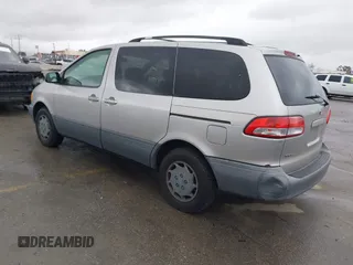 2002 Toyota Sienna CE with VIN 4T3ZF19C02U493816, listed as a IAAI auction lot 41813141 with 216,915 mi miles. Bid and sale history available at carsss.com. Image 3.