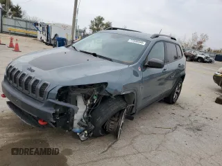 2015 Jeep Cherokee Trailhawk with VIN 1C4PJMBS0FW578199, listed as a Copart auction lot 77538544 with 122,444 mi miles and Salvage Title. Bid and sale history available at carsss.com. Image 1.