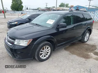 2017 Dodge Journey SXT z VIN 3C4PDCBG1HT531835, wystawiony jako IAAI lot #42867564 z przebiegiem 197 073 mil mil oraz . Historia ofert i sprzedaży dostępna na DreamBid. Obrazek 2.