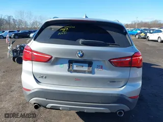 2018 BMW X1 xDrive28i with VIN WBXHT3C36J5L33781, listed as a IAAI auction lot 41497360 with 61,251 mi miles. Bid and sale history available at carsss.com. Image 16.