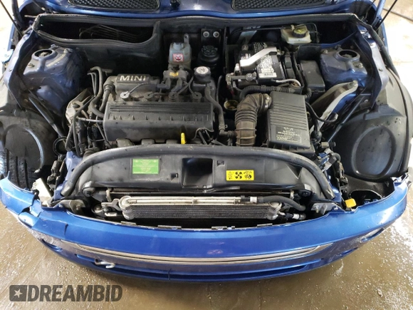 2007 MINI Convertible with VIN WMWRF33507TG16448, listed as a Copart auction lot 88474495 with 148,147 mi miles and Salvage Title. Bid and sale history available at DreamBid. Image 11.