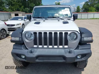 2020 Jeep Wrangler Unlimited Sport with VIN 1C4HJXDN6LW181802, listed as a IAAI auction lot 42402956 with 65,053 mi miles and . Bid and sale history available at DreamBid. Image 12.
