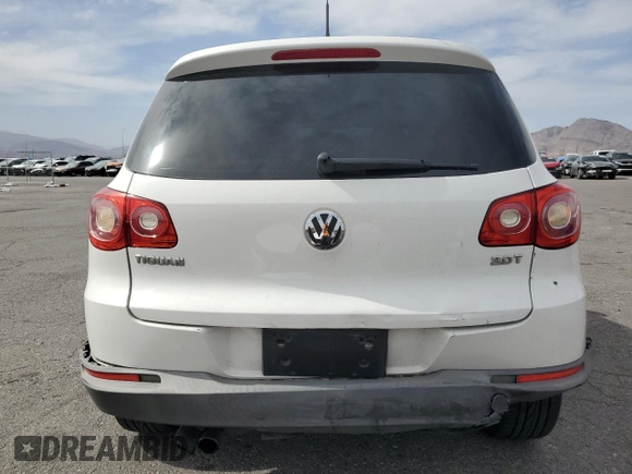 2010 Volkswagen Tiguan Wolfsburg Edition with VIN WVGAV7AX7AW003188, listed as a Copart auction lot 56692535 with 121,502 mi miles and Salvage title. Bid and sale history available at DreamBid. Image 6.