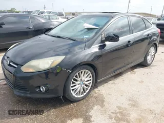 2013 Ford Focus Titanium with VIN 1FADP3J23DL152122, listed as a IAAI auction lot 41935180 with 175,065 mi miles and . Bid and sale history available at carsss.com. Image 2.