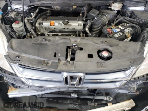 2011 Honda CR-V EX-L z VIN JHLRE4H74BC013467, wystawiony jako Copart lot #56919305 z przebiegiem 166 617 mil mil oraz Szkoda całkowita • Salvage title. Historia ofert i sprzedaży dostępna na DreamBid. Obrazek 12.