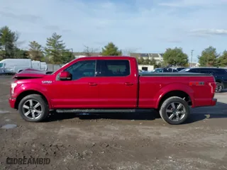2015 Ford F-150 XLT w/HD Payload Pkg with VIN 1FTFW1EF2FFB76243, listed as a IAAI auction lot 41150866 with 124,478 mi miles. Bid and sale history available at carsss.com. Image 14.