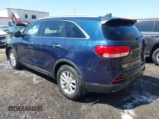 2016 Kia Sorento LX with VIN 5XYPGDA36GG009087, listed as a IAAI auction lot 41968021 with 150,658 mi miles. Bid and sale history available at carsss.com. Image 3.