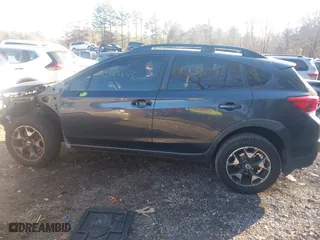 2018 Subaru Crosstrek Premium with VIN JF2GTABCXJH233021, listed as a IAAI auction lot 40963686 with 124,454 mi miles. Bid and sale history available at carsss.com. Image 14.