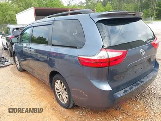 2015 Toyota Sienna XLE with VIN 5TDYK3DC1FS594123, listed as a IAAI auction lot 41944711 with 208,249 mi miles. Bid and sale history available at carsss.com. Image 3.