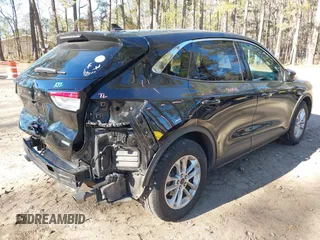 2020 Ford Escape SE z VIN 1FMCU0G6XLUA07056, wystawiony jako IAAI lot #41156940 z przebiegiem 103 707 mil mil oraz . Historia ofert i sprzedaży dostępna na DreamBid. Obrazek 4.