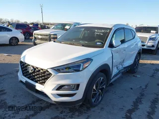 2019 Hyundai Tucson Sport with VIN KM8J33AL1KU838499, listed as a IAAI auction lot 41317832 with 71,594 mi miles. Bid and sale history available at carsss.com. Image 2.