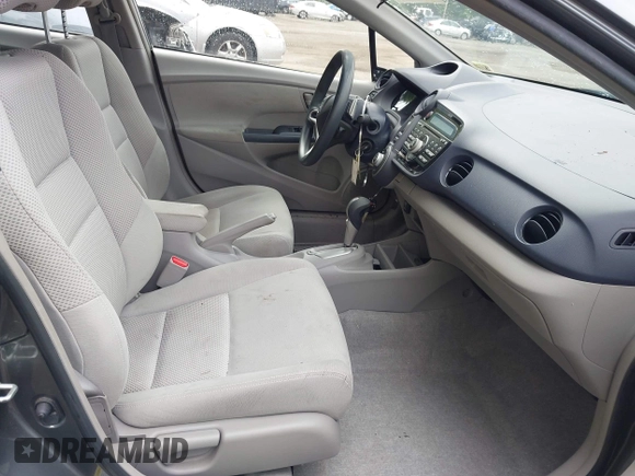2010 Honda Insight EX with VIN JHMZE2H73AS025856, listed as a IAAI auction lot 42183307 with 71,564 mi miles and . Bid and sale history available at DreamBid. Image 5.