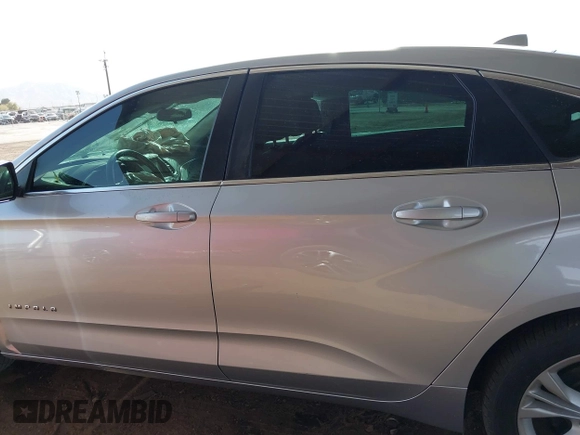 2014 Chevrolet Impala LT with VIN 1G1115SL6EU105818, listed as a IAAI auction lot 41678040 with 139,686 mi miles and . Bid and sale history available at DreamBid. Image 14.