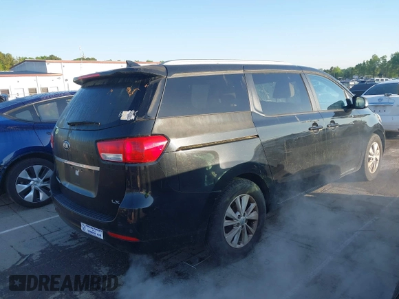 2016 Kia Sedona LX with VIN KNDMB5C15G6090413, listed as a IAAI auction lot 41991231 with 162,326 mi miles. Bid and sale history available at carsss.com. Image 4.