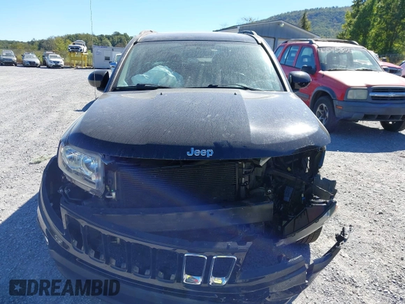 2016 Jeep Compass Latitude with VIN 1C4NJDEB5GD753210, listed as a IAAI auction lot 40530185 with 87,045 mi miles. Bid and sale history available at carsss.com. Image 13.