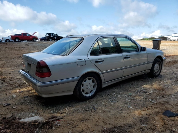 1999 Mercedes-Benz C 230/260/280/320 with VIN WDBHA24G4XA749633, listed as a Copart auction lot 56560105 with 221,306 mi miles and Salvage title. Bid and sale history available at DreamBid. Image 3.