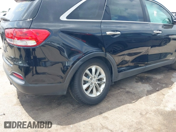 2016 Kia Sorento LX z VIN 5XYPGDA50GG112670, wystawiony jako IAAI lot #42170870 z przebiegiem 165 053 mil mil oraz . Historia ofert i sprzedaży dostępna na DreamBid. Obrazek 6.
