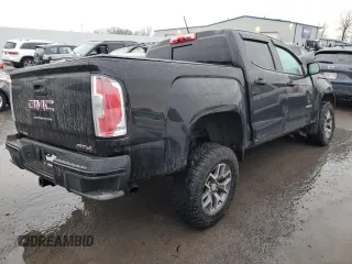 2022 GMC Canyon 4WD AT4 w/Cloth with VIN 1GTG6FENXN1264798, listed as a Copart auction lot 83303824 with 0 mi miles and Salvage Title. Bid and sale history available at carsss.com. Image 3.