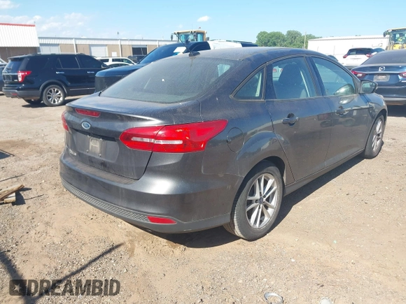 2017 Ford Focus SE with VIN 1FADP3F22HL341553, listed as a IAAI auction lot 42305588 with 165,016 mi miles and . Bid and sale history available at DreamBid. Image 4.