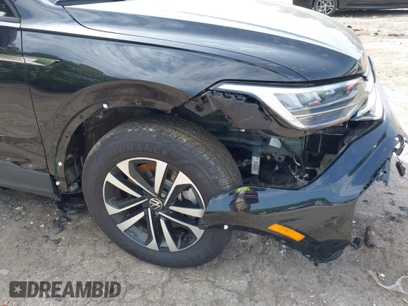 2023 Volkswagen Tiguan S with VIN 3VVRB7AX6PM108735, listed as a IAAI auction lot 42108217 with 13,279 mi miles and . Bid and sale history available at DreamBid. Image 18.