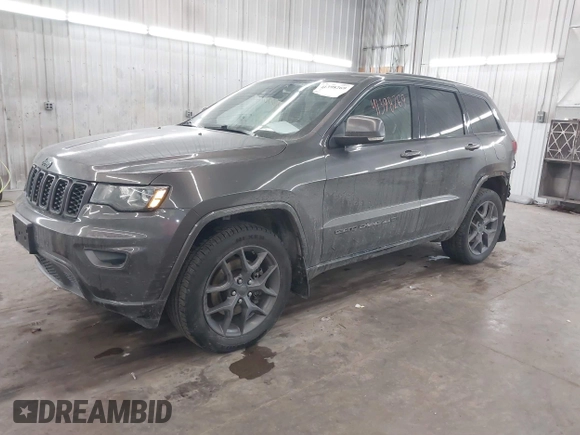 2021 Jeep Grand Cherokee 80th Anniversary z VIN 1C4RJFBG9MC580645, wystawiony jako IAAI lot #41398269 z przebiegiem 79 057 mil mil oraz . Historia ofert i sprzedaży dostępna na DreamBid. Obrazek 17.