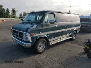 1991 GMC Vandura z VIN 1GDEG25K6M7504729, wystawiony jako Copart lot #71146614 z przebiegiem 181 800 mil mil oraz Tytuł czysty. Historia ofert i sprzedaży dostępna na DreamBid. Obrazek 1.