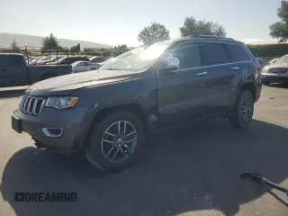 2018 Jeep Grand Cherokee Limited with VIN 1C4RJEBG5JC301438, listed as a Copart auction lot 61646835 with 66,568 mi miles and Salvage title. Bid and sale history available at DreamBid. Image 1.