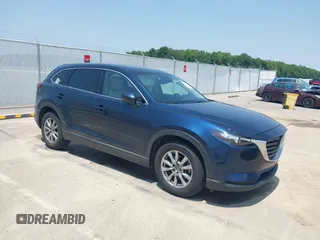 2018 Mazda CX-9 Touring with VIN JM3TCBCY3J0220372, listed as a IAAI auction lot 42405192 with 104,556 mi miles and . Bid and sale history available at DreamBid. Image 1.
