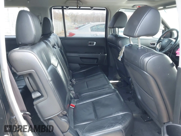 2012 Honda Pilot Touring with VIN 5FNYF4H96CB041380, listed as a IAAI auction lot 41941615 with 137,537 mi miles and . Bid and sale history available at DreamBid. Image 8.