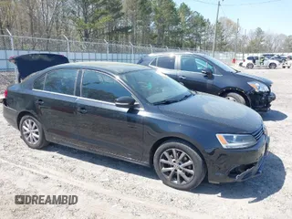 2014 Volkswagen Jetta SE z VIN 3VWD17AJ0EM202482, wystawiony jako IAAI lot #41907812 z przebiegiem 145 789 mil mil oraz . Historia ofert i sprzedaży dostępna na DreamBid. Obrazek 1.