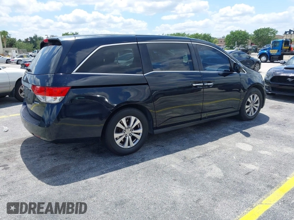 2016 Honda Odyssey SE with VIN 5FNRL5H36GB078398, listed as a IAAI auction lot 41995777 with 169,910 mi miles. Bid and sale history available at carsss.com. Image 4.