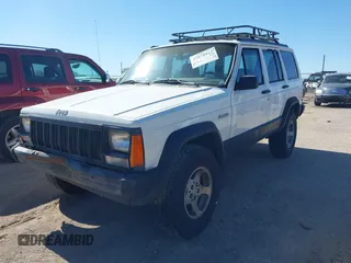 1996 Jeep Cherokee SE with VIN 1J4FJ28S0TL328637, listed as a IAAI auction lot 42078412 with 333,223 mi miles and . Bid and sale history available at DreamBid. Image 2.
