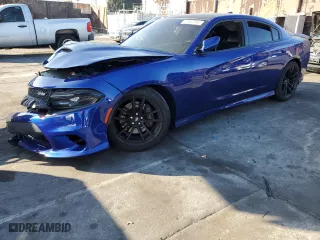 2019 Dodge Charger Scat Pack with VIN 2C3CDXGJ7KH549321, listed as a Copart auction lot 87487544 with 54,487 mi miles and Salvage Title. Bid and sale history available at carsss.com. Image 1.