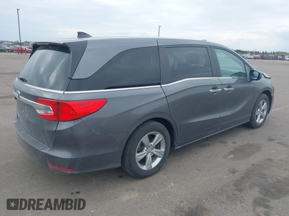 2018 Honda Odyssey EX-L z VIN 5FNRL6H72JB090127, wystawiony jako IAAI lot #42167788 z przebiegiem 114 984 mil mil oraz . Historia ofert i sprzedaży dostępna na DreamBid. Obrazek 4.