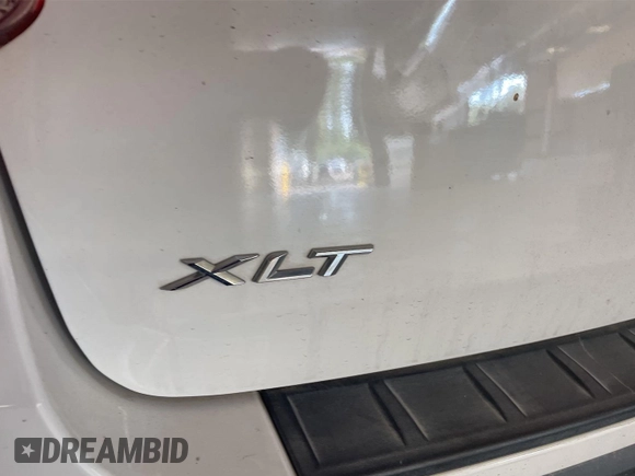 2022 Ford Explorer XLT z VIN 1FMSK8DH4NGB74570, wystawiony jako IAAI lot #42636570 z przebiegiem 43 979 mil mil oraz . Historia ofert i sprzedaży dostępna na DreamBid. Obrazek 1.