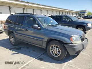 2004 Jeep Grand Cherokee Laredo with VIN 1J4GX48S74C195326, listed as a Copart auction lot 53993785 with 280,456 mi miles and Salvage title. Bid and sale history available at DreamBid. Image 4.