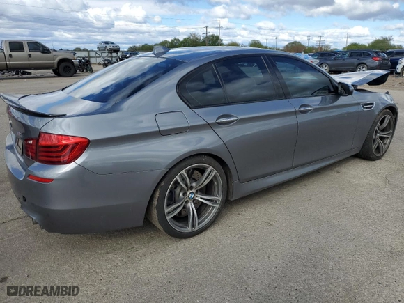 2014 BMW M5 with VIN WBSFV9C58ED097741, listed as a Copart auction lot 53825714 with 81,403 mi miles and Salvage Title. Bid and sale history available at carsss.com. Image 3.
