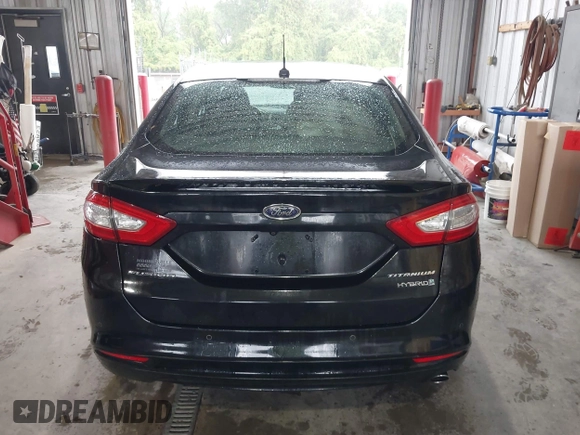 2013 Ford Fusion Titanium Hybrid with VIN 3FA6P0RU4DR281789, listed as a IAAI auction lot 41909115 with 161,008 mi miles and . Bid and sale history available at DreamBid. Image 17.